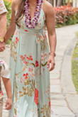 This was definitely a lovely dress and had beautiful colors that fit into the backdrop of our Hawaiian sunset. It's a layered dress and the quality of the dress is amazing. It's a very long dress even with tall wedges, so I got it altered to shorten it. Will definitely get this dress in another color. - Mony C.