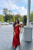 So I think you can never go wrong with a satin dress! This was perfect for the fall and especially a Fall wedding. The color was beautiful and I got several compliments on my dress. I do wish the dress didn't roll as much on the top, but I just taped it down and it stayed perfect throughout the night. Super comfortable. - Nathalie M.