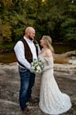 I ordered 3 different sizes in this dress for our last minute elopement. Based on reviews I thought the Medium would work but it was a little too snug for comfort, the Large fit perfectly everywhere! The XL was way too big so I returned it. The return process was super easy! I did keep the M and L. I wore the L for our elopement which is pictured and I'm hoping to fit into the medium by the time we throw a reception/party! I absolutely love everything about this dress! - Melissa H.