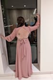 This is the perfect dress to wear as a wedding guest. I have a very large chest and the dress shows it off for sure. I love the open back detail and the material is good quality. It is very long, even with heels I will have to get it hemmed. - Maggie S.