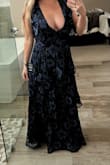 I was so in love when I saw this dress online and couldn't wait to get it. I planned on wearing it to a wedding. When it came, I was excited to see such great quality. I put it on and it fit perfectly and was so comfortable&except for the neckline. It must be my body shape, because it doesn't look scandalous on any of the other review pics, but it was just way too low cut for me. It could be that I'm not used to my postpartum chest, but I just couldn't do it and was super sad to have to return it. - Caitlin L.