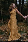 Loved the dress. First tried a small but it was a little too tight around the belly. Love the medium. Fits nicely and was perfect next to the fall colors for my engagement pictures! - Lynzie T.