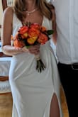 This dress is beautiful and fits well.
The straps on the back allows you to adjust the dress and it was just perfect for my civil ceremony. - Carol G.