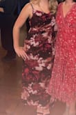 Based on other reviews, I ordered a size large rather than a medium (my usual size). And the dress fit great! Classy can be dressed up or down. I got a lot of compliments on the print. Good colors for fall/autumn time weddings or events. :) - Erin P.