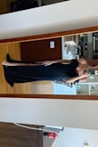 I got this dress for a bridesmaid dress, the top was very loose on me. It looks amazing & hits all the right spots. I got the smallest size & would of sized down if possible. It is very classy & has a gummy sticky top to help it stay up.
IT is hard to raise your hands over your head in it but personally that's not a problem. - Nicole L.