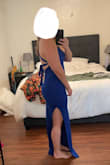 I was kind of nervous that this dress was on final sale, but I figured that for the price, I might as well get it! I was pleasantly surprised. The quality is nice, and it's super flattering and comfortable. You can adjust the straps that tie around your back to help tighten or loosen the top. The color makes it a little more unique as well - it definitely "pops" in a crowd. - Aline A.