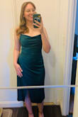 I purchased this dress to wear as part of my engagement photoshoot for formal photos in a library, and I am in AWE!! This dress makes me feel so confident, and it hugs my body in all the right places. The way that the fabric gathers at one hip really cinches the waist. The dress is still tea-length, so it is appropriate for many different occasions. I highly recommend!!! - Michelle C.