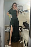 The dress is super nice fabric and the lower half is pretty heavy when just holding, but feels lightweight on. The zippers are good quality and in the perfect places. My only complaint is the length. I figured getting a size smaller than I usually do I would have some leeway with the length, but nope. it touches the floor and with my 4 inch heels it's still brushing the floor. Unless there's a short version or you're willing to alter it, I wouldn't get this dress if you are relatively short for your size. - Samantha G.
