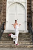 I loved the look! This fit perfectly - pant length worked great with my long legs and heels. The wiring in the top keeps the V nice and stable, and the material is stretchy and comfortable! I got so many compliments on the look! - Victoria L.