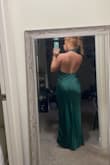 It fits perfectly besides in the bust for me because I am very small chested. The rest of the dress fit like a glove. I made a small stitch to bring In the sides and it now fits. - Brooklynn S.