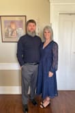 I can't say enough about this dress!  It is so beautiful, exactly as pictured.  The fit was perfect, except it was a little low cut for my comfort level. I bought a small, black, hook and eye closure and sewed into the dress, problem solved.

The navy blue fabric is absolutely gorgeous, the sleeves are so pretty.

Would hands down order this dress again. - Tricia M.