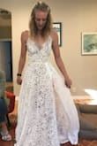 I actually really liked this dress, but ultimately it felt a little too revealing for my wedding. The top was too big for me, but that wouldn't have been a factor as I'm sure it could be tailored easily. The fabric is totally see-through with just a tan bodysuit (literally like a one-piece swimsuit with a snap in the crotch) to cover you, if you think that's ok for your wedding vibe I would totally recommend this dress as it's nice and weighty and very flattering. The back is super cute! - Molly L.
