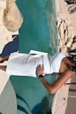 The dress fit beautifully and had a nice stretch. The length was perfect to incorporate a high split. Loads of compliments! - Kanasha S.