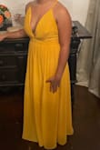Dress looked wonderful for a wedding. The skirt begins right below the bust and that fit a bit snug compared to other Lulus dressed with the same fit. Also, some of the pleats on the bust lost their form quickly even after being pressed. As all Lulus dresses, I had this one hemmed and adjusted slightly. - Camila D.