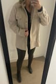 I love this shacket! Quality material, however, heed the other reviews! I originally ordered a small and I was swimming in it. The arm length was very long too. I returned the small for an extra small, which ended up being much better while still having an oversized look. I'm usually a medium in Lulus and I was worried that going down two sizes would be way too small. I'm glad Lulus makes returns so easy but save your time and size down on this particular product. Pictured is the xs. - Riley R.