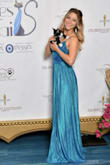 I wore this for our local animal shelter's gala and I received lots of compliments! It's a beautiful dress and the quality fits the price. Color is a bit darker than pictured. - Laura L.