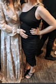 Bought this for my best friend's wedding reception. I'm 4 months pregnant and this dress has the perfect stretch but also stayed up super well. Never loved tight dresses before pregnancy and this made me feel so confident! It was the right length on me but may be too long for those shorter. - Emily M.