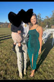 I loved this dress! It was very comfortable and perfect for the event I wore it to! I would say I'm more pear-shaped (typically a size 6-8) and liked the way the dress fit my body and curves. The strap was the perfect amount of support as I wasn't constantly worried about pulling it up as I chased around my toddler or danced the night away! I also loved the length and the height of the slit! - Chelsie H.