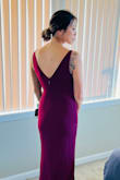 The dress fit perfectly and made me look curvier than I am. It was very classy and elegant, and despite not showing much skin, was also very sexy given the fit. Just a touch long with 2.5 inch heels, but otherwise exactly what I was looking for! - Charlene C.