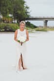 I had already boughten a dress, but kept coming back to this one online. This looked to be my dream dress and nothing like the one I bought. Two days after purchasing my other dress I made the plunge and bought this dress. It was 3 weeks before my wedding so I ordered rush shipping and it came very quick! I ordered a small based on all the other reviews I read that were my same size but when I got the dress I quickly went to put it on and it sadly would not go over my hips. I initiated an exchange for a medium as the dress was even more beautiful in person. The process was easy and I had the new size within days. The medium fit perfect! I wore this for my beach wedding and it was the perfect material. I definitely recommend this dress! - Somer C.