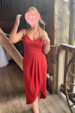 I received so many compliments on this dress, and the color really popped with my complexion! I ordered a large and medium since I was nervous about the dress running small in the bust from other reviews. Even with a strapless bra on, the medium fit perfect! The large wasn't terrible but it definitely gaped at the sides. It needed to be ironed when it arrived, but I absolutely love it! - Victoria G.