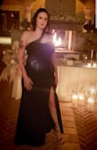 I ordered this dress for a black tie wedding and it was absolutely perfect.  It was truly unique with the shoulder strap and super sexy leg slit. The fabric was stretchy and very forgiving (couldn't even notice the minor lumps in my shapewear). I got many compliments and where did you get that dress!  Buy this dress! - Alicia W.