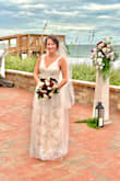 Wore this to my small beach wedding. I felt beautiful and it photographed great. Extremely comfortable and well-made. I got so many compliments. Its pretty long but I wore tall wedges and didnt have to alter it. Im pear shaped and it was very flattering. Wore a regular bra which was awesome. - Katie J.