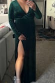 I bought this for an upcoming military ball and it fits me perfectly. I did add skims underneath just to smooth out my curves and it's perfect. I ended up getting platform shoes and I'm glad I did. The dress is a lot longer than I expected but I love the look. I plan on getting boob tape though for the day. - Kelly W.