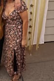 I bought this dress for my cousin's rehearsal dinner in October and it is so flattering for my body type! I was worried that it would be tight in the bust area since I am a DD but I think the ties in the back help. I cannot wait to wear this and get some good pics in this dress! - Raquel H.