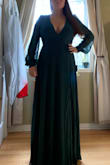 I had been eyeing this dress for about a month before I decided to go for it, and Im so glad I did. Im 55 and will need to wear 3 in heels for it to be a good length. I usually wear a size large in clothing, and the large fit perfectly. If you have a larger bust, than you will need to size up. I will also need to pin the boob to make sure I stay decent at the wedding, but I'm very satisfied. It wraps around in the rib area, accentuating the smallest pet of my figure. The material is flowy and nice, and not see through at all. Glad I went for the purchase. - Asha M.