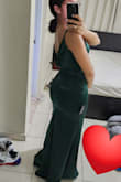 This dress fits like a glove. The fabric feels very high quality, the color is gorgeous. I ordered size xsmall, Im 5'4" and 120 pounds. - Claudia P.