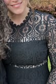 I've been a loyal Lulus shopper since 2011 and usually fall in the M-L size (depending on fit and specific item). I tried this dress in a M + L + XL and wound up having to go with the XL. It's a snug fit with absolutely no stretch and delicate lace that you have to be mindful of but BOY does it look good when it's on. Had to attend a "gothic" all black wedding so this worked perfectly! - Caitlyn K.