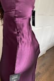 This dress is a really pretty color and I love how it fits beside the long length. What I don't like is the backstitching... There are two visible lumps and it looks like the inside was sewn incorrectly. I'm not sure if it's worth having a tailor try to fix it so I'll probably end up returning. - Nia C.