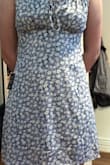 This is a great casual dress to wear in the summer, especially since it is shorter (It is very short like in the photo so just wear bike shorts underneath). It looks exactly like the photo and is quite adjustable at the shoulder straps and front too. - Dawn T.