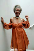 I wore this to an outdoor jazz fest in PHX, it was a beautiful breezy day with enough sunshine to make it feel comfortable with the sheer, long sleeves. The length and fit were perfect for my height and curves. It was a fun dress to wear and the perfect color for fall against my skin tone.
One complaint: the sheer fabric easily attracted the shea butter from my back and shoulders and stained the material. I'm hoping to find a hack to get rid of the stains. - Mia J.