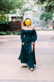 This dress is insanely flattering. Gorgeous green color, beautiful sheer sleeves, tasteful sexy leg slit. Really perfect for my engagement photoshoot. - Elle K.