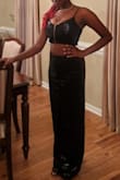 Bought this for a homecoming dance. Wanted to look sexy w/o having to wear a dress...this outfit did not fail. I'm a small with D size bust. With a little boob tape I had complete support. The sequins were on there solid and it looked more expensive in person. I love the wide leg look. Didn't want bellbottoms. I really loved that you could adjust the straps and appreciated the tie string closure in the back. Overall great buy! - Melissa V.