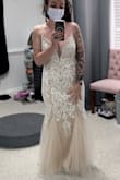 Was in the DB several times only to realize those dresses are of the same quality you can find RIGHT HERE. I did have a few alterations made but I'm so thankful I didn't have to come out of pocket 1k for a stunning dress. - Erika G.