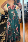 I looove this dress. I bought it for a destination wedding and it fits like a glove. It is a little long for me at 5'5 but I like wearing heels so it will be fine. Also, I did size down based on other reviews and I'm glad I did. I have a small rib cage though so I would say base the size you get off your rib cage size since that's where it's tight. The only other thing I will note is that it wrinkles. So the packability isn't great and I will have to iron/steam it when we land. - Solana B.