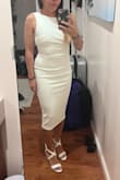 I was looking for a simple wedding dress for my city hall ceremony and I love love love this dress. Even though I am shorter 5ft it hits below the knee with is fine with me cause it'll be colder when I get married. I plan to use an adhesive bra because I am smaller chested. Overall really happy with the fit and material of this dress and can't wait to wear it. - Chris C.