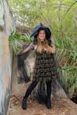 I was searching for a cute dress that I could wear for a costume but also wear again for other occasions. This dress is super cute and totally hit the mark. Only thing is the cross-back straps and zipper make it hard to put on by yourself! Otherwise I love it!! - Lisa S.