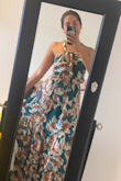 I got this dress for a day wedding, the fabric is absolutely amazing, it didn't feel too heavy or hot, just perfect. The back is just lovely, a bit tricky to figure out at first but it's very beautiful. I order size M and fit just perfect. - Ana G.