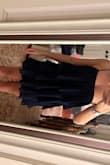 This is a great dress. Kinda short, but the tiered layers kind of hides that. It feels a little loose on the bust, but I think tightening the shoulder strap will help. So fun & can't wait to wear! - Teagan M.
