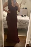 Looked great but was long even with heels. I think I could've went down a size because the material is stretchy. - Amanda O.