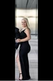 This dress hit all of my curves. I wore it for our engagement photo session. I have a long torso so there was no need to get it altered. I ordered a medium due to the fabric having a nice stretch to it. Received lots of compliments. - Kerri B.