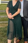 I really like this dress. The color is just as expected. I wore it to a wedding and it was perfect.

I only have a few gripes about it. 

It's a mock wrap dress and was far too loose in the bust. I'm a 36B and would say a pretty average bust size. I tacked it so I wouldn't flash anyone if I bent over.

Secondly&. The skirt liner was inside out. The seams were facing outward and the only reason it's not a huge deal is because they're not visible unless the top skirt is lifted.

Finally, the slits for the top and under skirts did not seem to line up, so my leg was never fully uncovered. Constantly needed shifting.

Just a bit disappointed because I've never had quality issues with a Lulus dress before. Still love the dress and will wear it over again for special occasions! - Meg B.