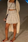 It's really cute! I was surprised at how well the skirt fits. It doesnt hike up in the back like most of these type of skirts do if you have any butt at all. The top was little big on me only because I'm smaller on top, but it was very noticeable. - Felecia M.