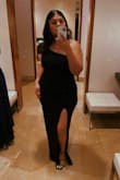 I wore this to a formal wedding and it was absolutely perfect. I received lots of compliments on the style of the dress and the slit (of course). I'm between a size 10 and 12 with wider hips and the XL fit best. I was lucky that my heels were the perfect height (3.5 inches) so I didn't need to hem the dress. Really happy with it! - Diana V.