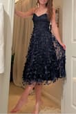 Wow, I am so grateful to have snagged one of these dresses! It kept going out of stock but after checking multiple times a day, my size (Small) was restocked! This dress came so quickly and fit like a glove. I think the corset back & adjustable straps really help customize the fit of the dress. It is soo sparkly in person and of great quality. I cannot wait to wear this to an upcoming holiday party! - Alison J.