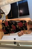 I'm absolutely obsessed with this dress! It runs a bit small (hard to zip), but I think a medium would have been too big in the hips for me (no hips, here). I love the contrast of the velvet and the floral pattern. So unique and so trendy! - Claire S.